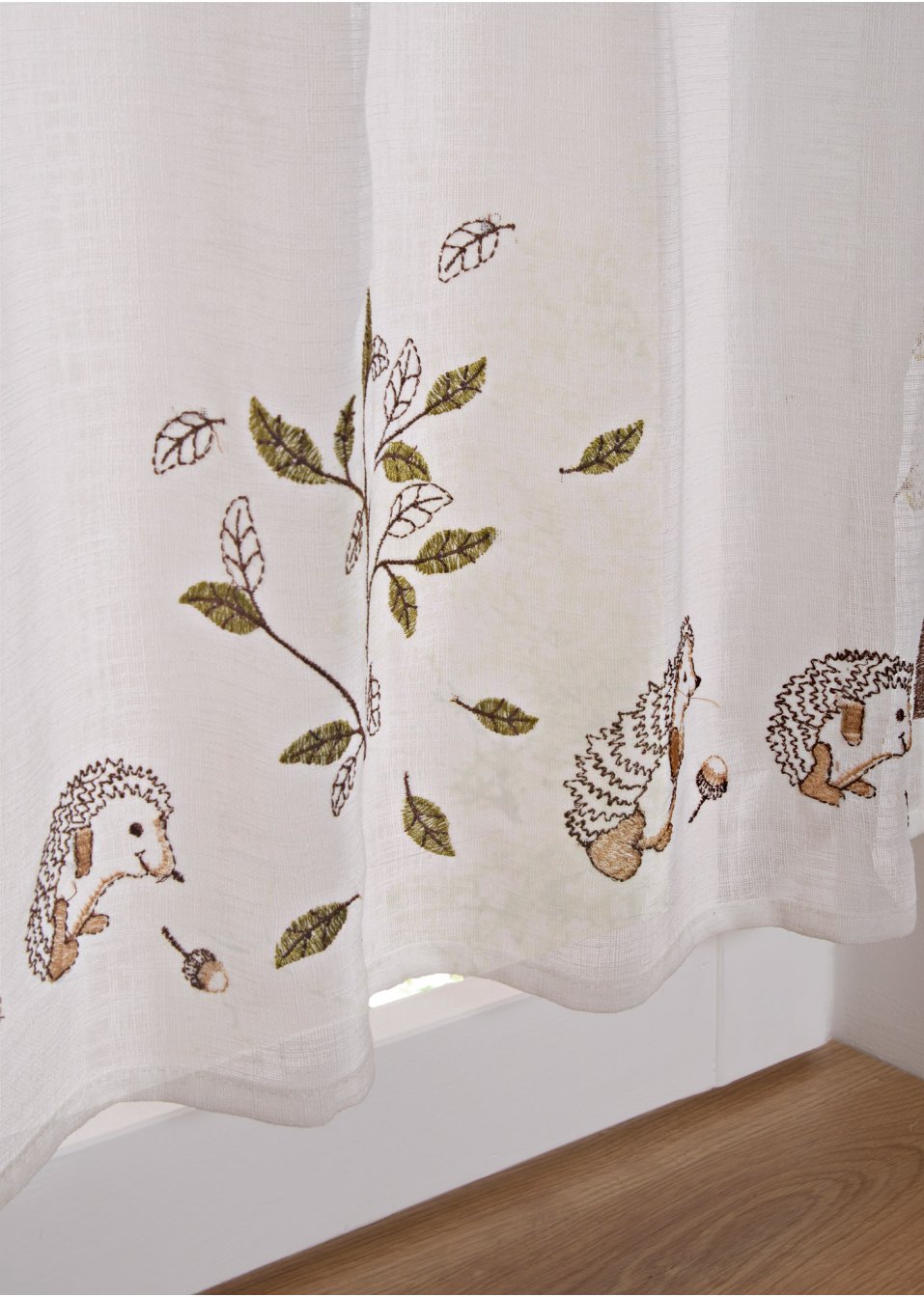 Brise-bise avec broderie
