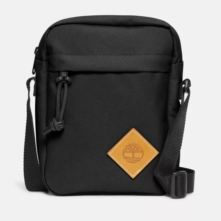 Bolsa transversal Timberland Core, unissex, na cor preta.
