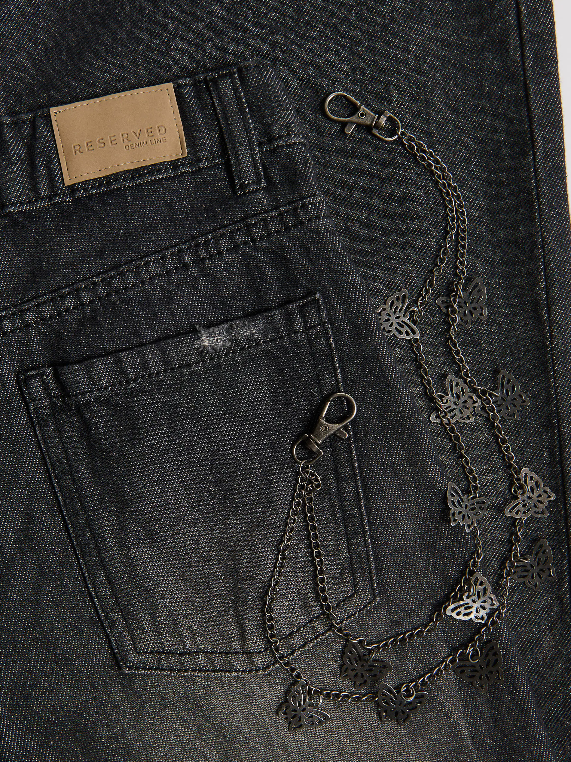 Super-Wide-Leg-Jeans mit Kette