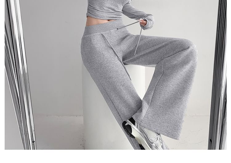 Shira - Lage, uitlopende joggingbroek met trekkoord