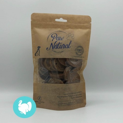 Hambúrguer mini natural com sabor de peru da Paw para cães.