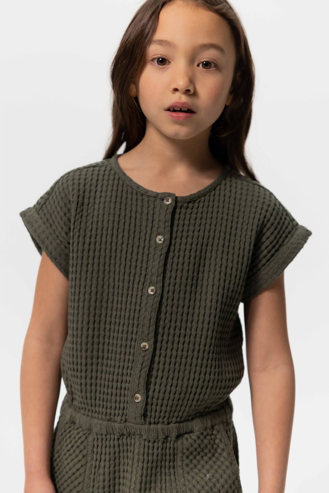 Donkergroene jumpsuit met wafelstructuur