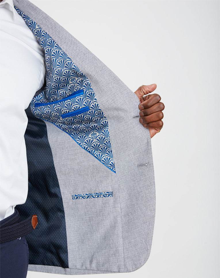 VESTE GRISE AVEC COUDIÈRES
