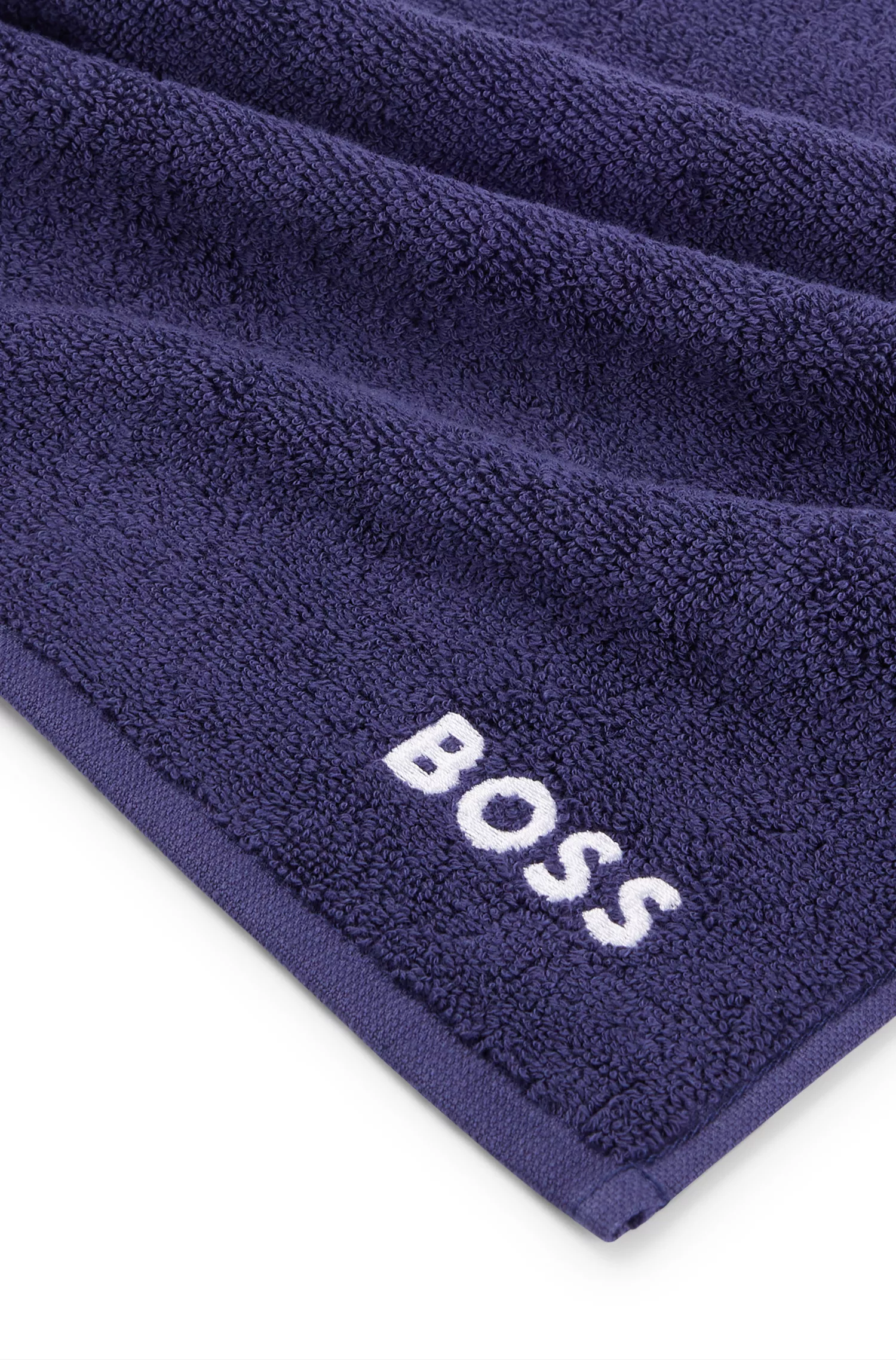 Toalha de rosto BOSS em algodão preto com bordado do logotipo branco