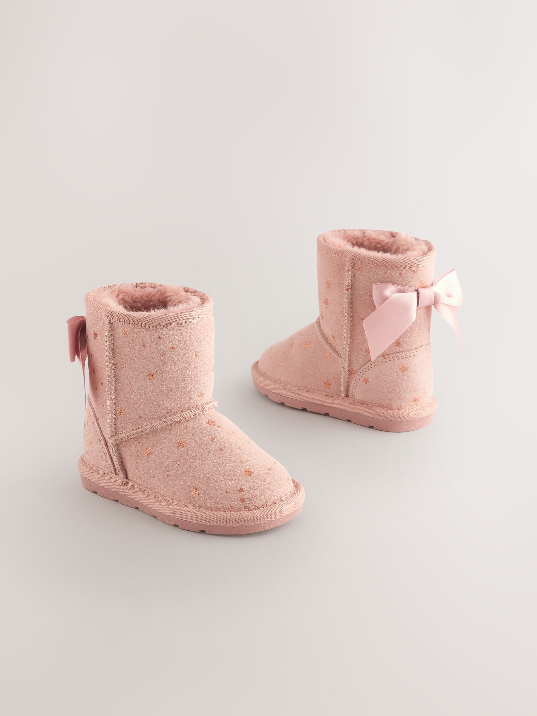 Roze met strik - Waterafstotende hoge suède instaplaarzen