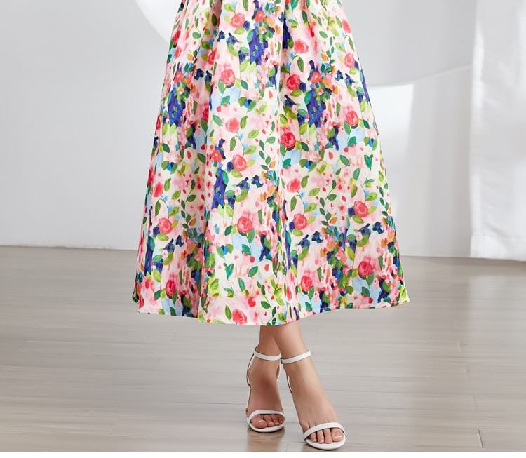 Aurora - Mouwloze maxi-A-lijnjurk met bloemenprint