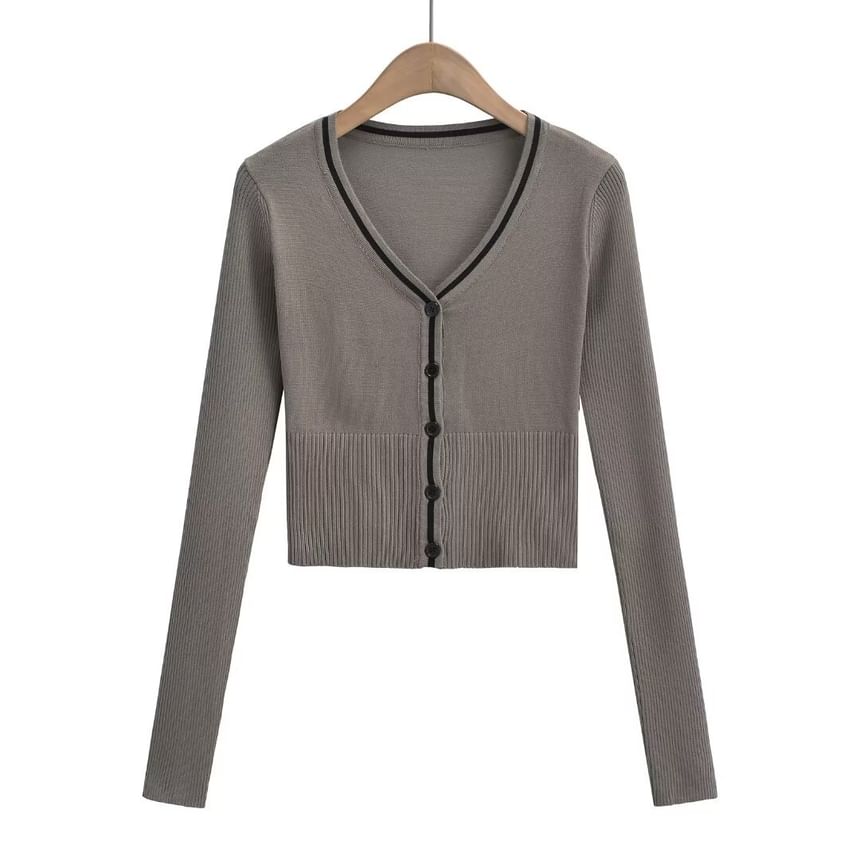 Sundine - V-hals vest met contrasterende bies en knoopjes