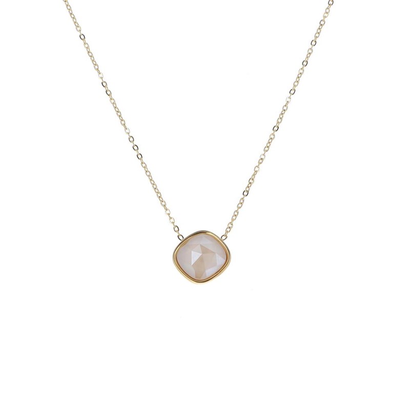 Collier en acier maille dorée orné d'un cristal taillé couleur ivoire avec chaînette réglable
