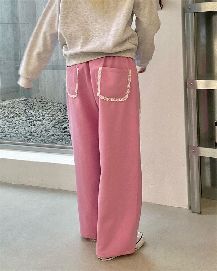 PINPI - Elastische taille, kanten rand en wijde pijpen joggingbroek