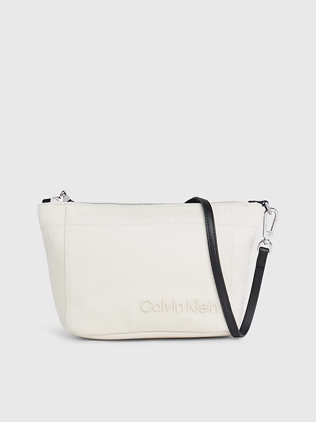 Bolsa de mão conversível em lona