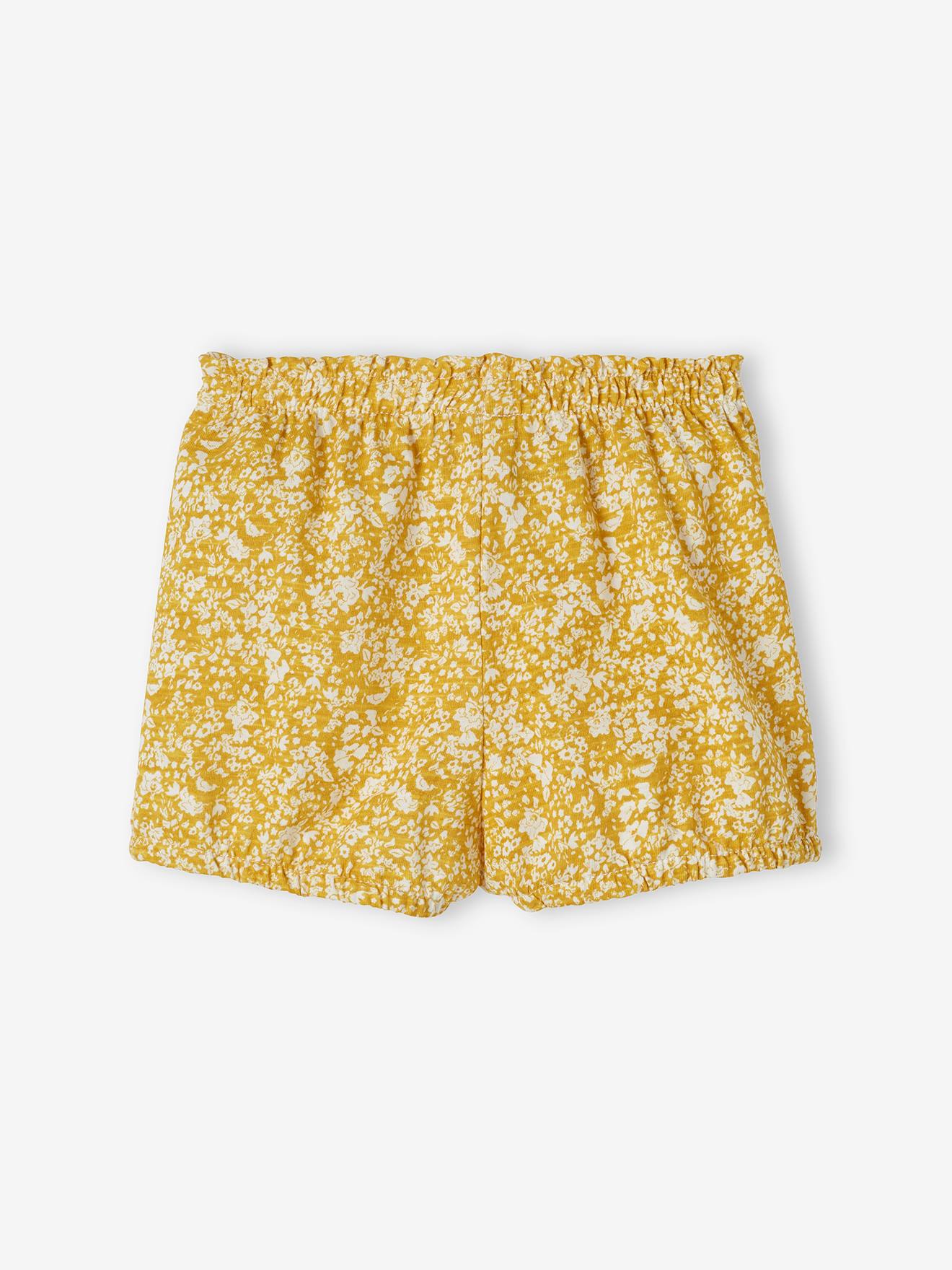 Calção infantil feminino em malha azul-escura com estampa.