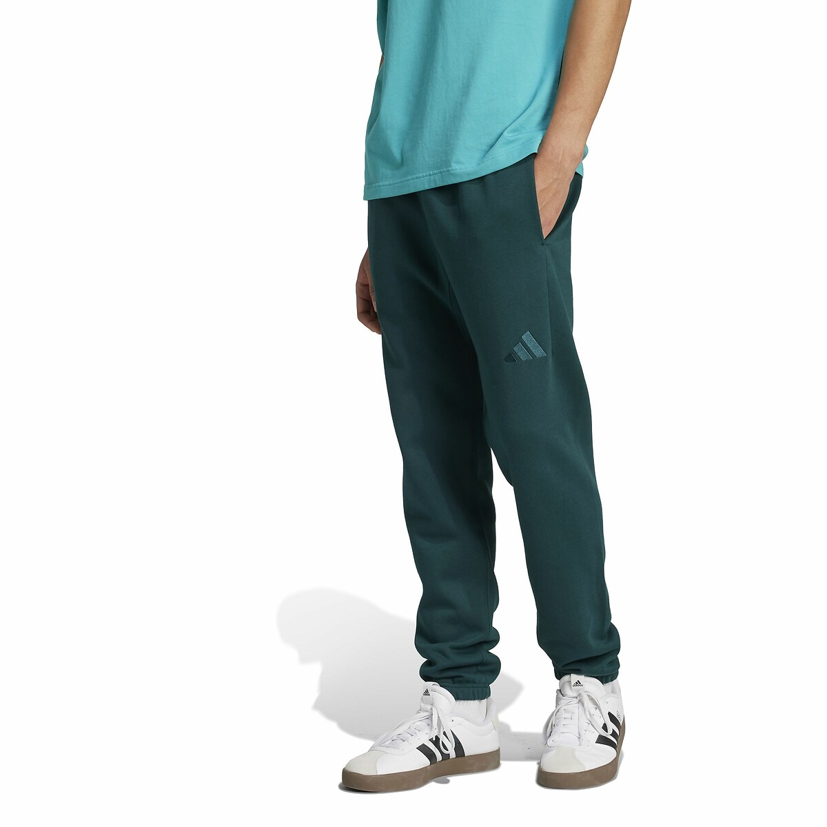 ROUPAS ESPORTIVAS ADIDAS<br>Calças de lã polar padrão com corte afunilado - TODAS AS TEMPORADAS