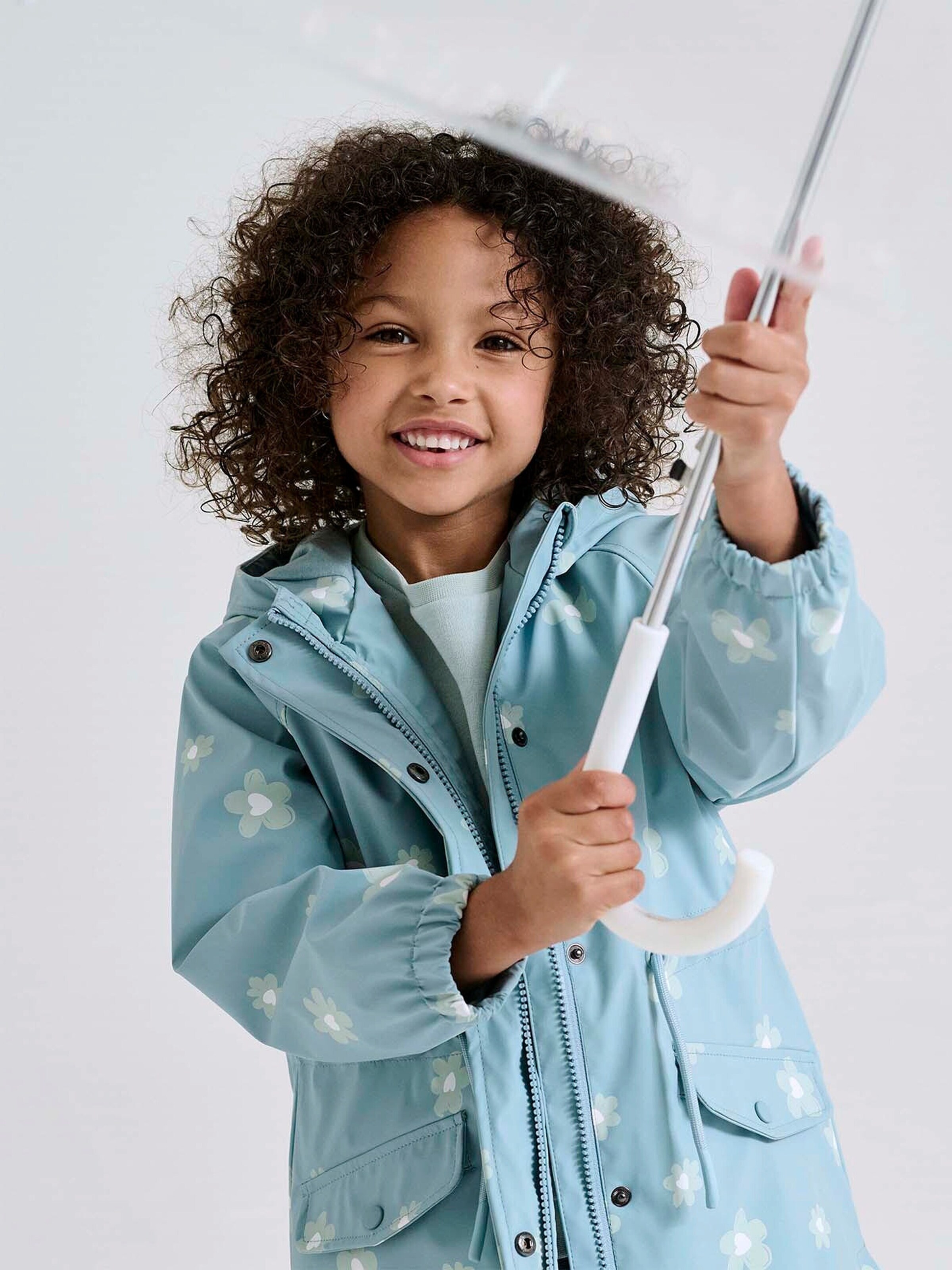 Vertbaudet Mädchen Regenjacke mit Zauber-Trick himmelblau