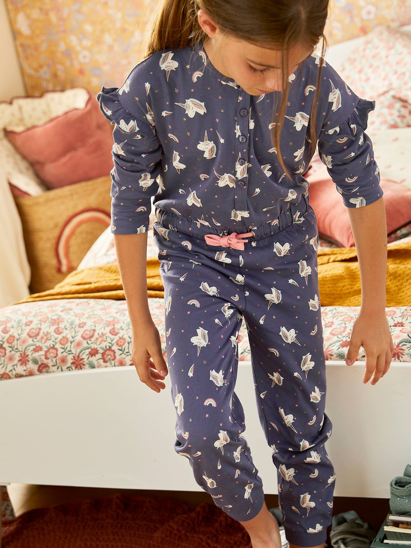 Pijama macacão unicórnio, tamanho médio infantil, azul liso com estampas.