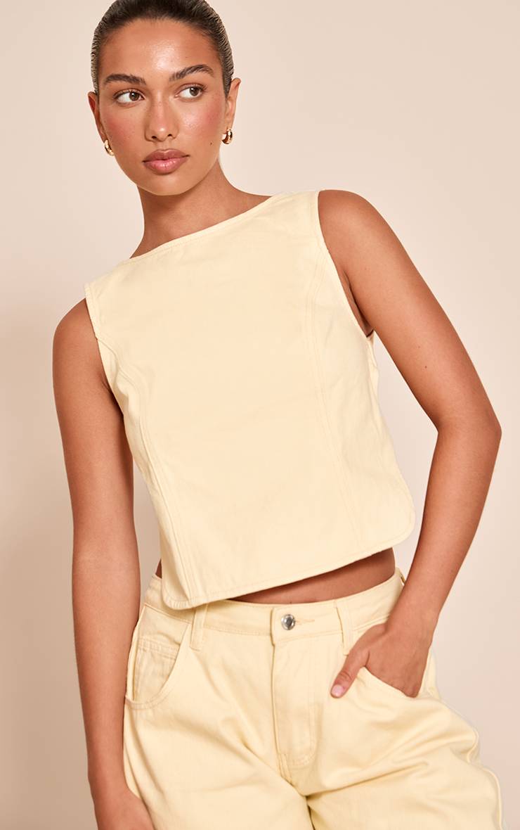 Pale Yellow Top En Denim Sans Manches Crème Beurre Avec Lien Au Dos