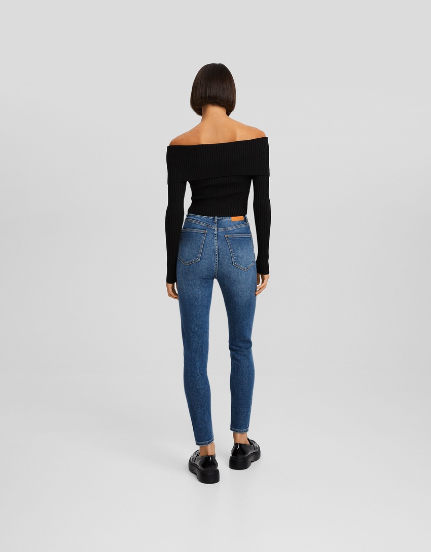 calça jeans skinny de cintura super alta