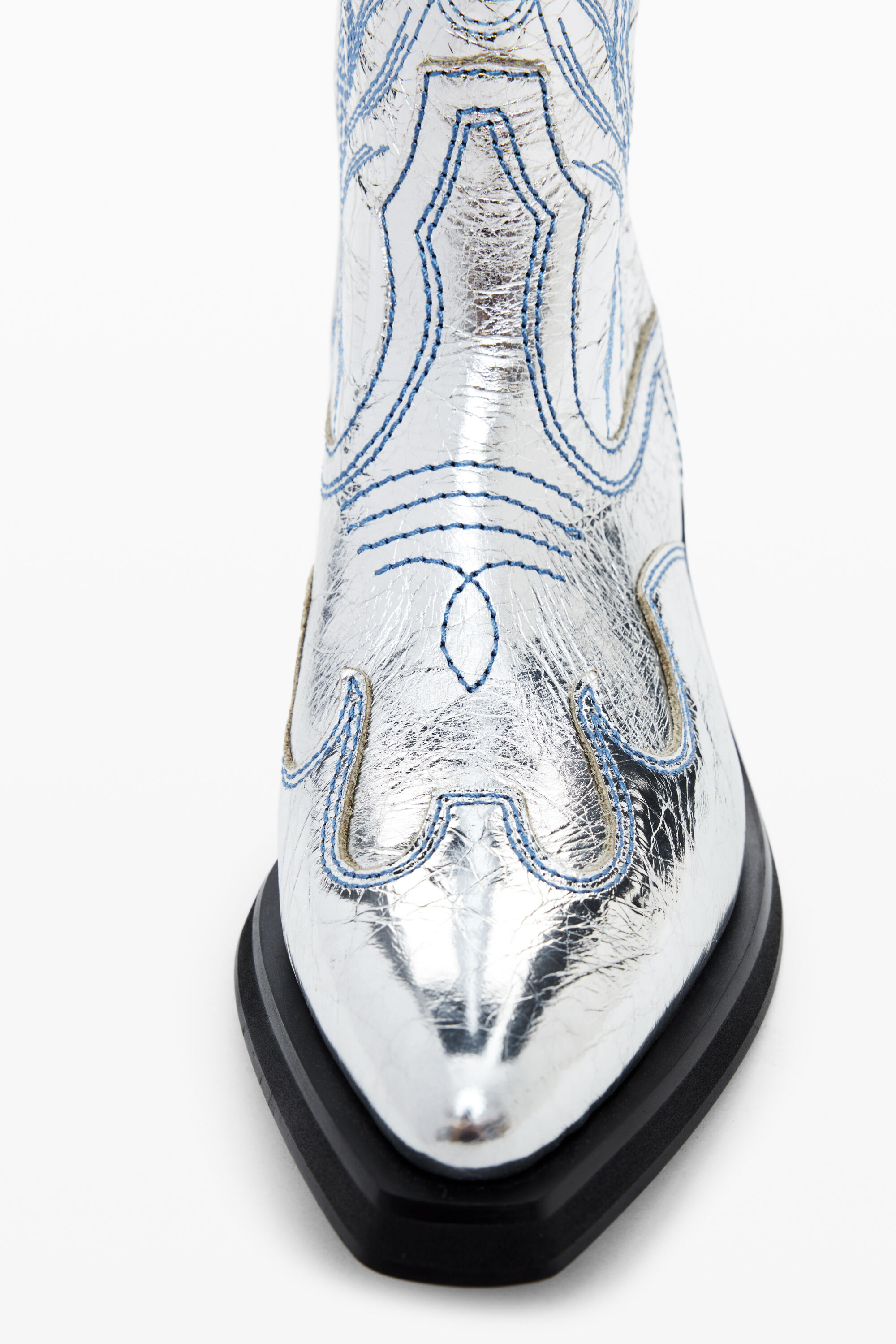 bota de cowboy metálica