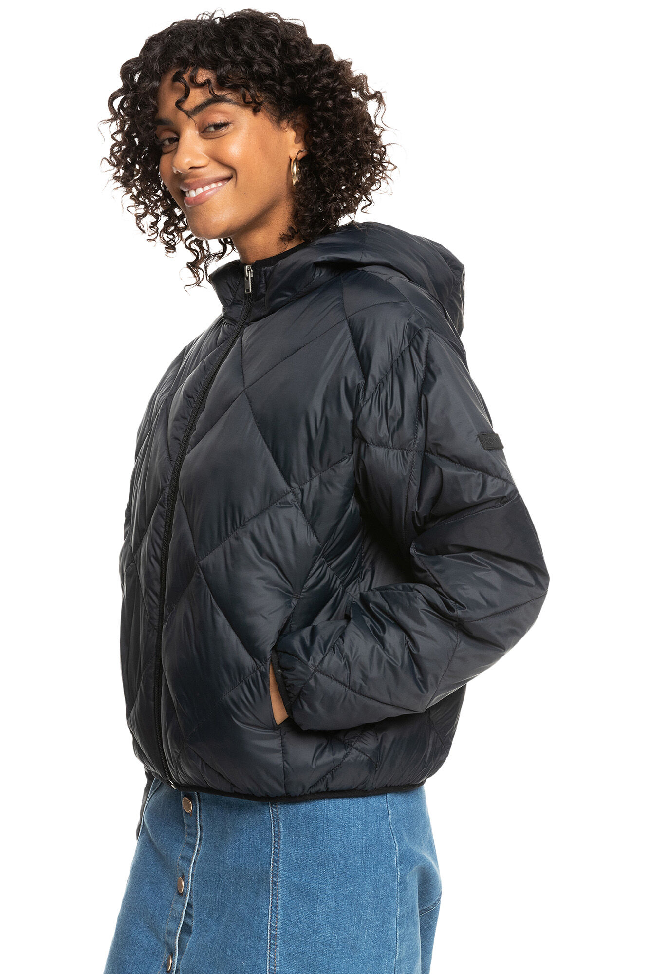 Jaqueta feminina acolchoada, leve e compressível, com estampa de vento.
