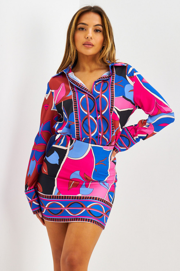 Ensemble chemise + jupe courte bleu/fuchsia à motif année 80