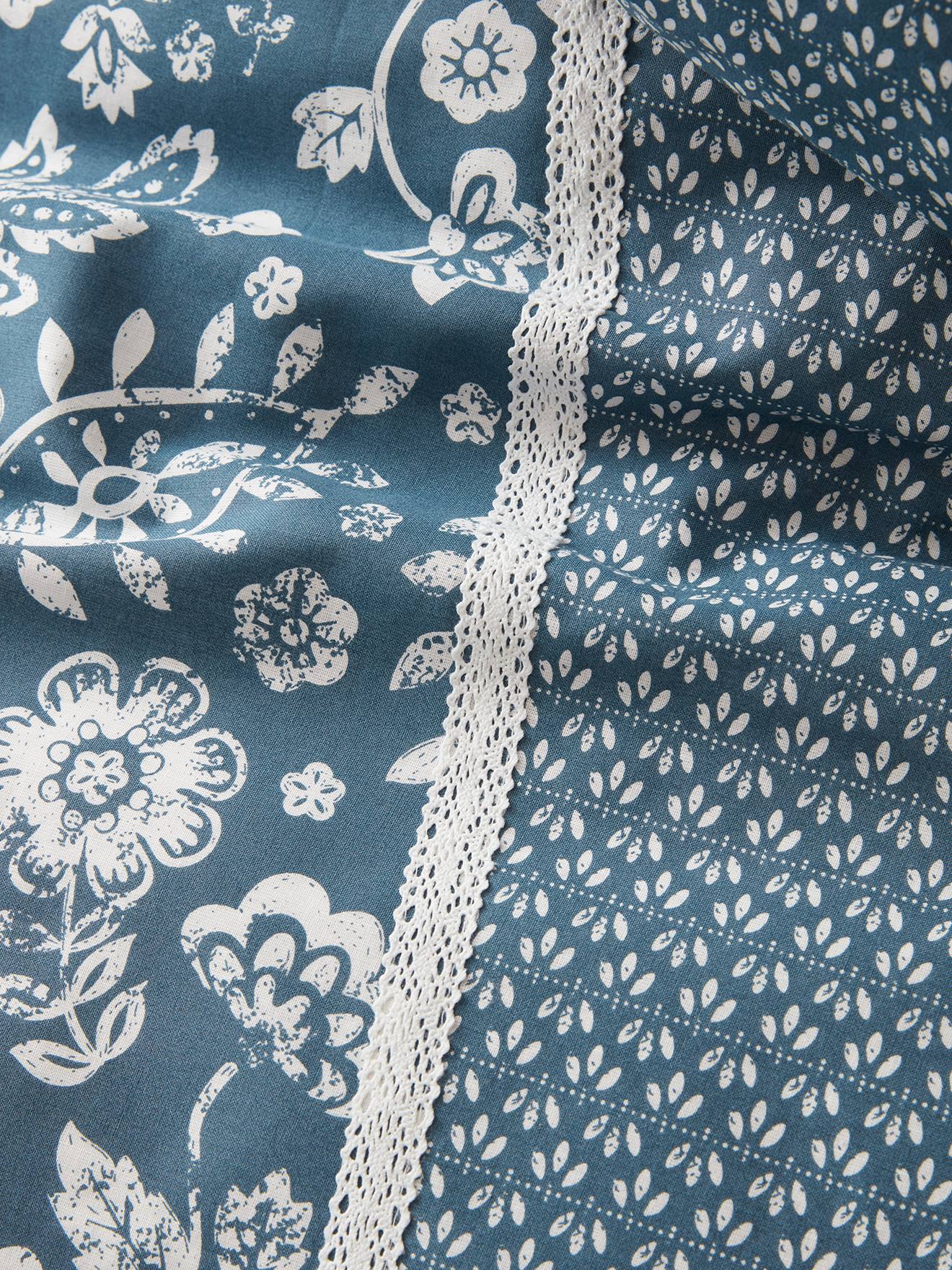 Conjunto de capa de edredom e fronha infantil Caravan, azul escuro liso com estampas.