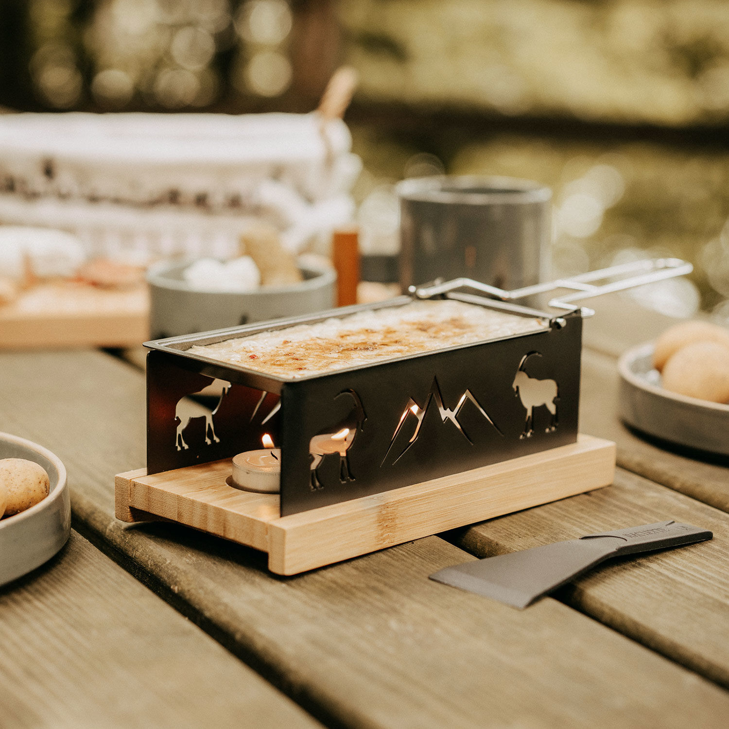 Kerzenraclette Steinbock
