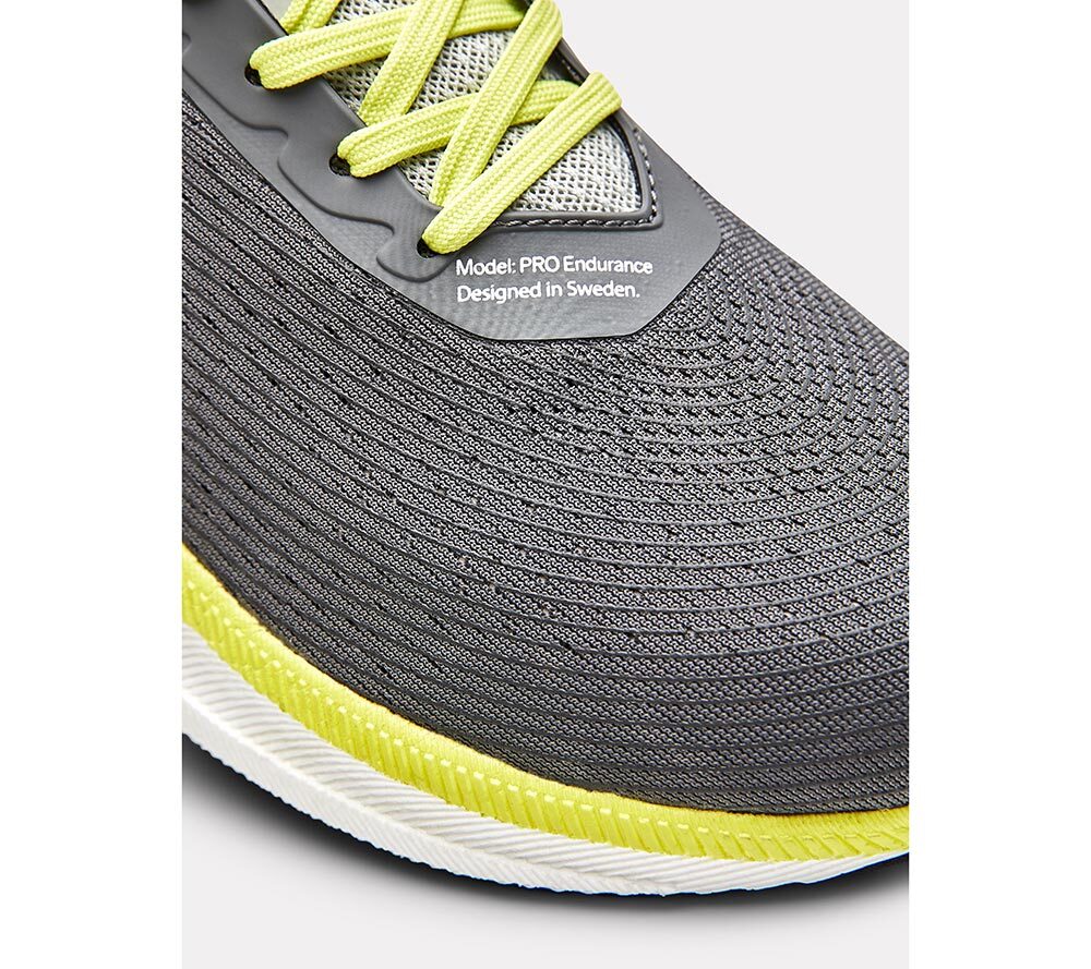 Craft PRO Endurance Distance Hardloopschoenen Grijs/Geel Dames