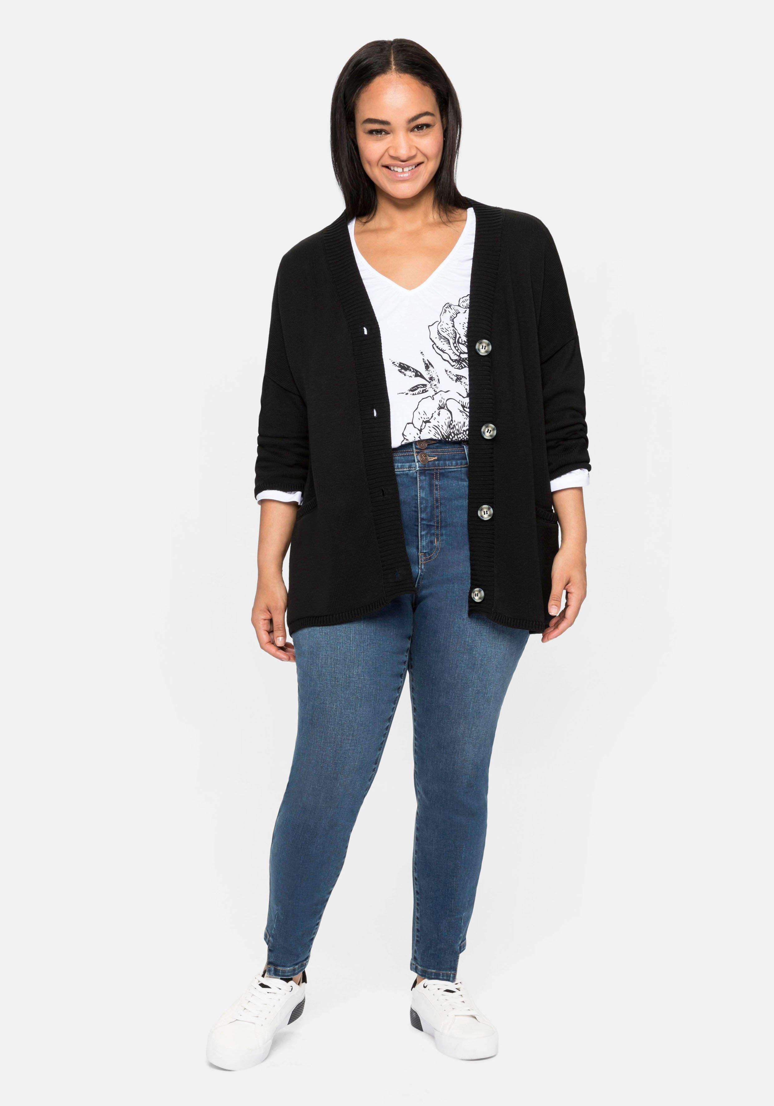 Strickjacke in Kurzform mit großen Taschen