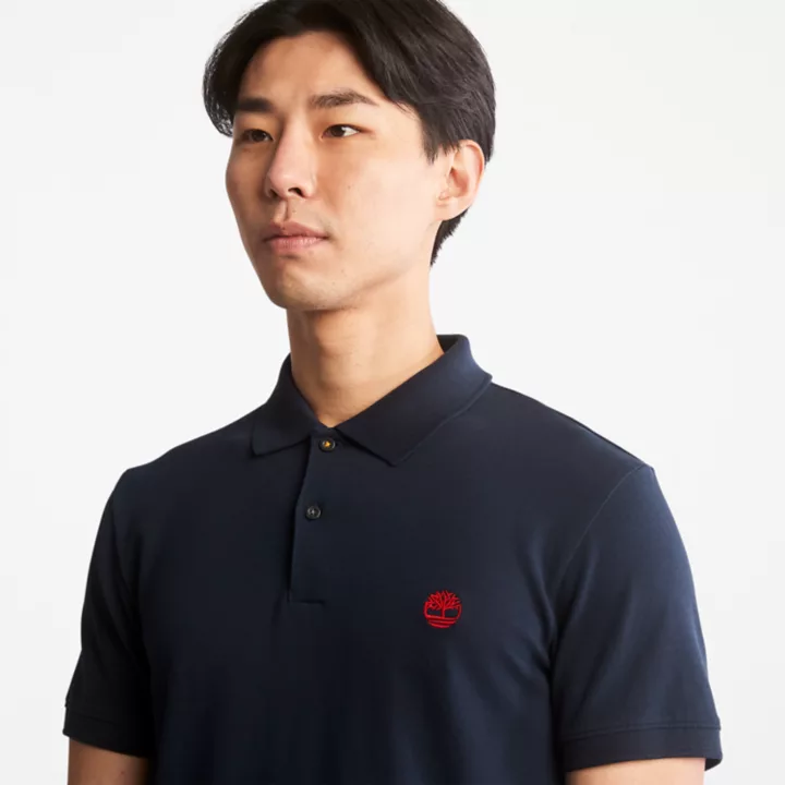 Polo stretch Merrymeeting River pour homme en bleu marine