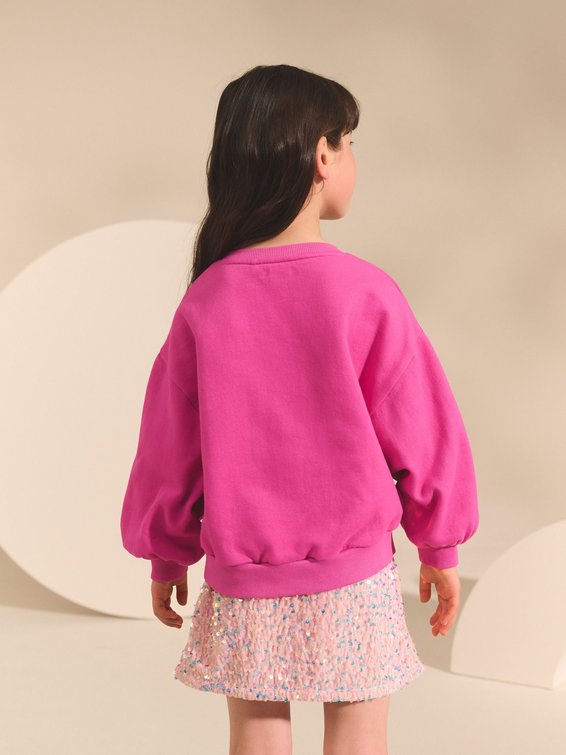 Felroze met lovertjesster - Sweatshirt (3 - 16 jr)