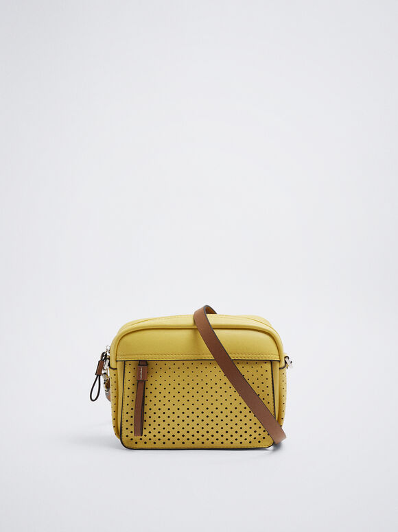 Bolsa transversal com detalhe perfurado - Amarela