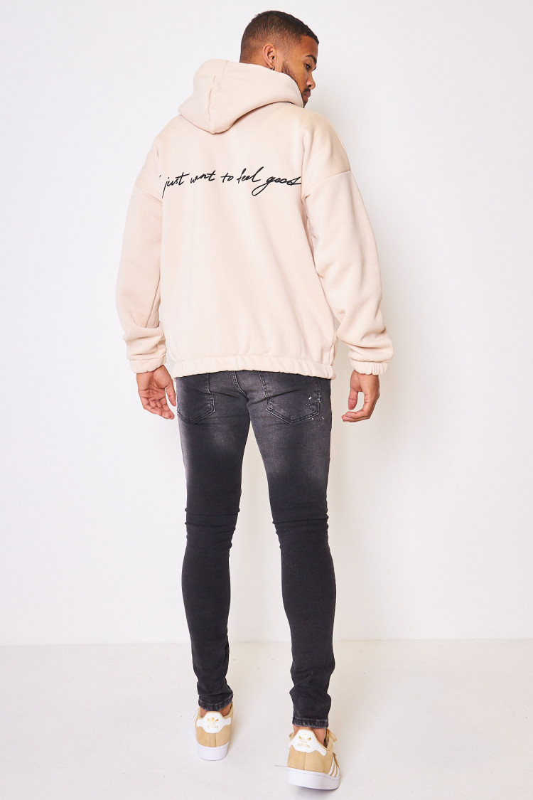 Sweat à capuche beige illustré