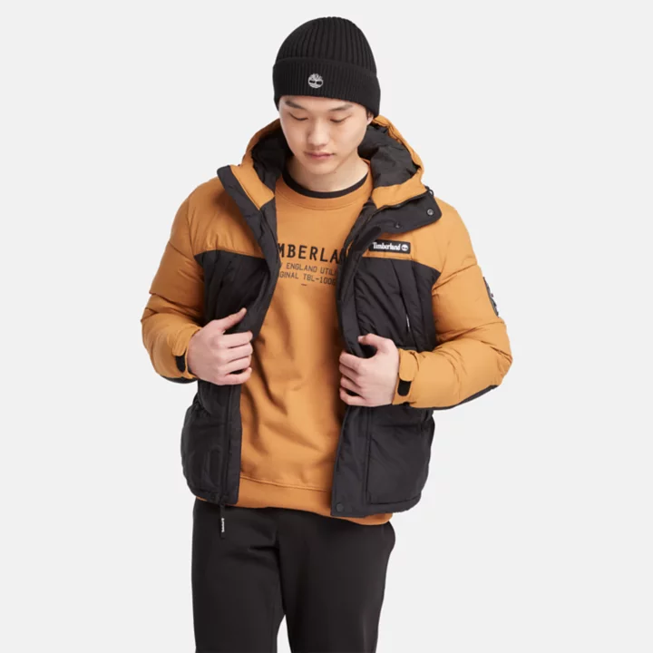 Jaqueta puffer Outdoor Archive masculina na cor amarelo escuro.