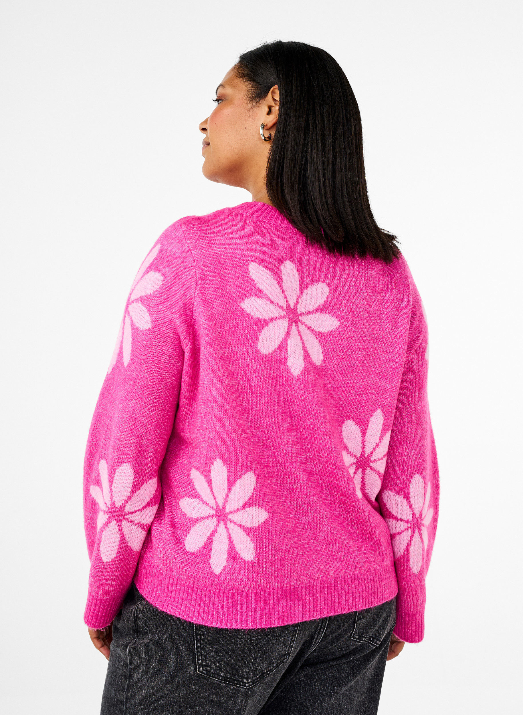Strikbluse med blomster