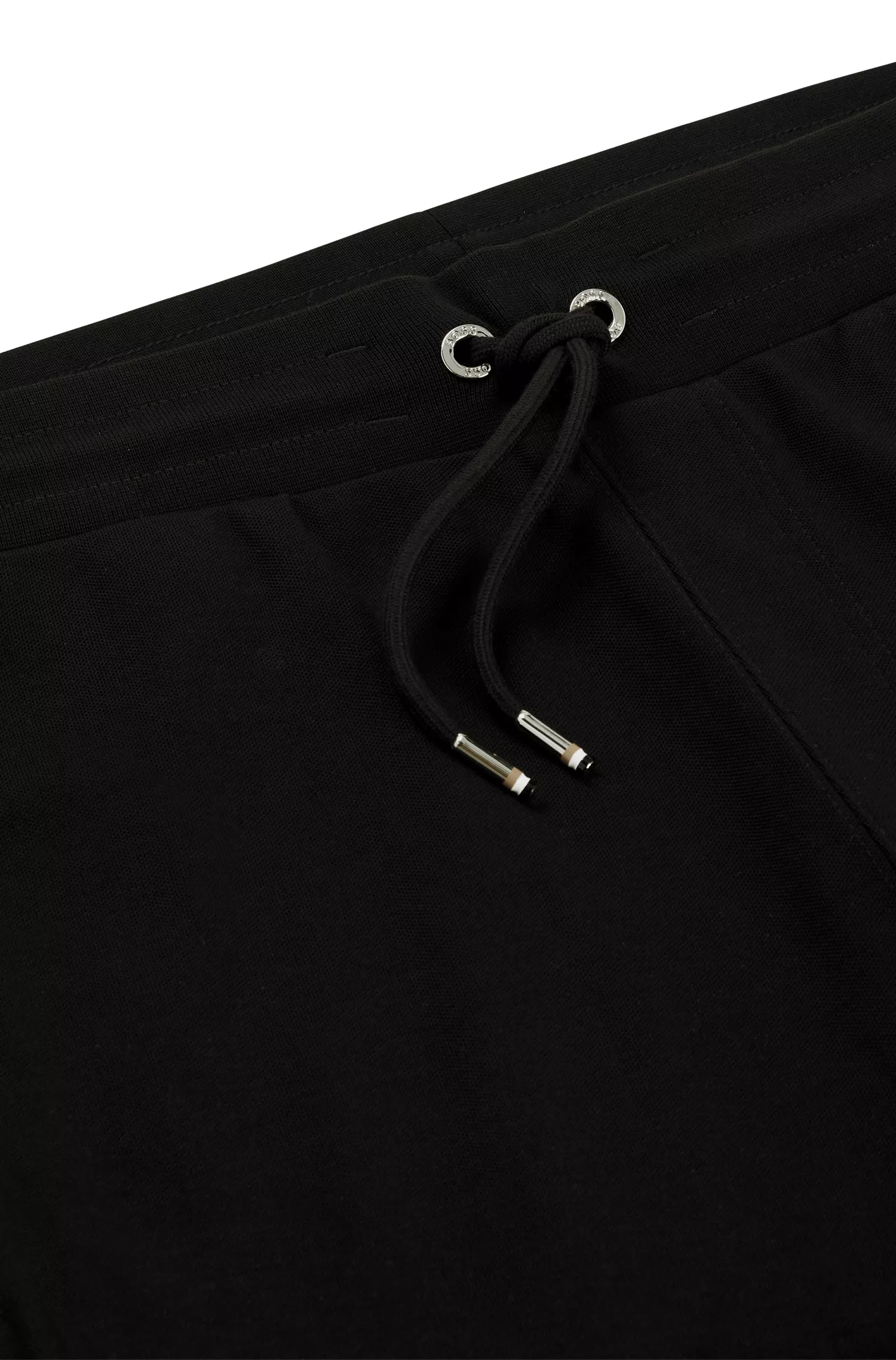 Calça de fato de treino BOSS em mistura de algodão preto com detalhes de riscas características da marca.
