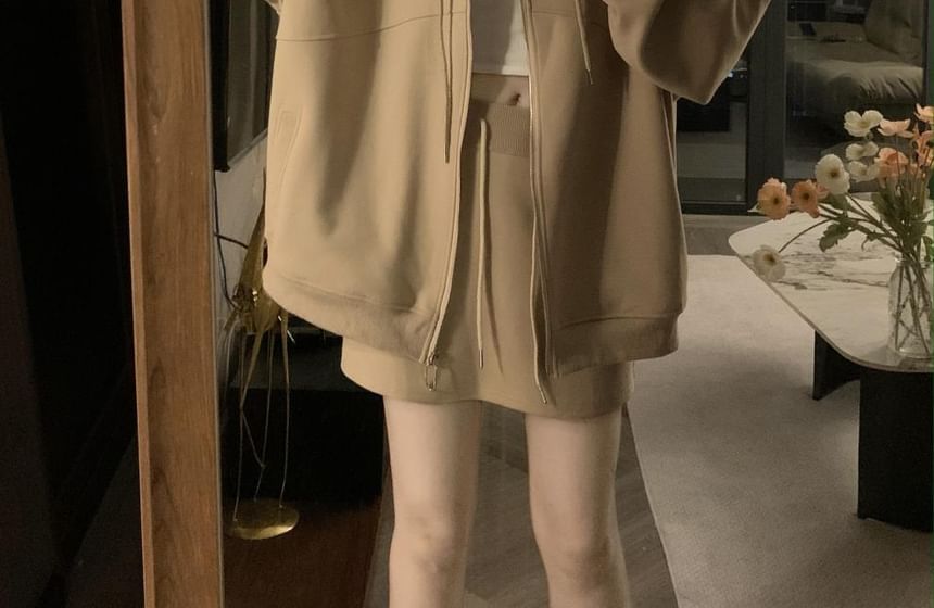 Hanji - Effen oversized hoodie met rits / mini-kokerrok met trekkoord in de taille