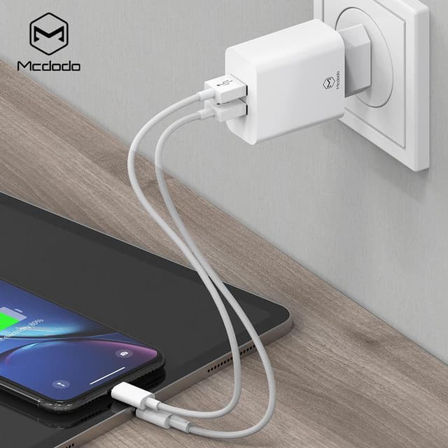 Mcdodo CH-6720 kit Wall oplader, oplader med 2 x USB-porte A og en lyn kabel (Non MFI) af sync og opladning 1m hvid
