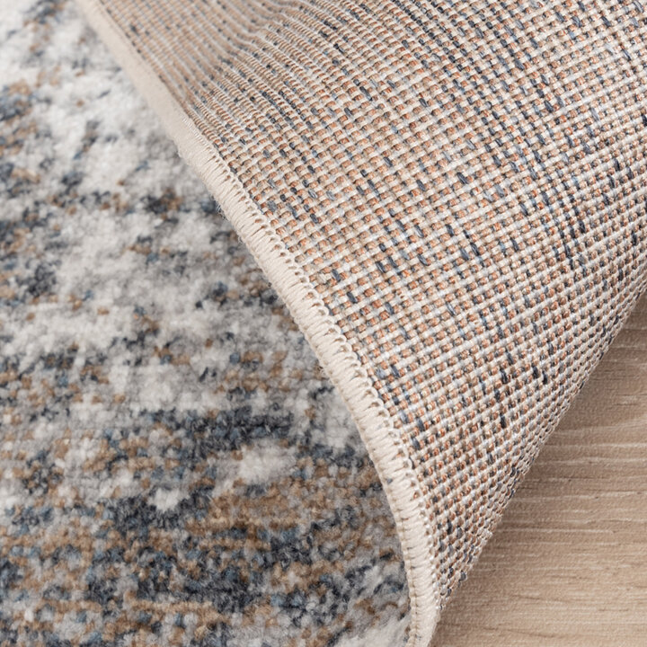 Rond wasbaar vloerkleed - Misha Grunge Creme/Grijs