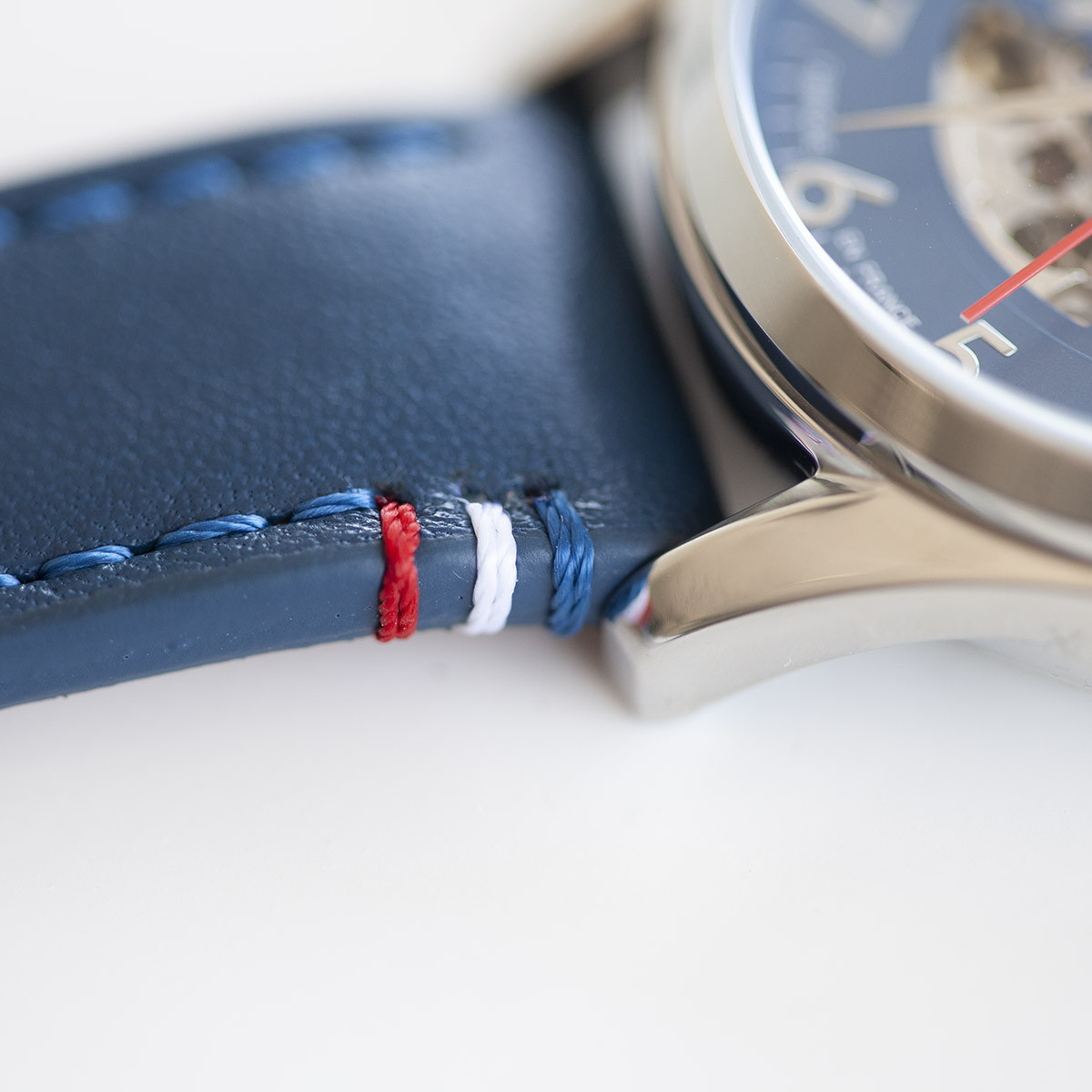 Montre homme squelette automatique acier bracelet cuir bleu