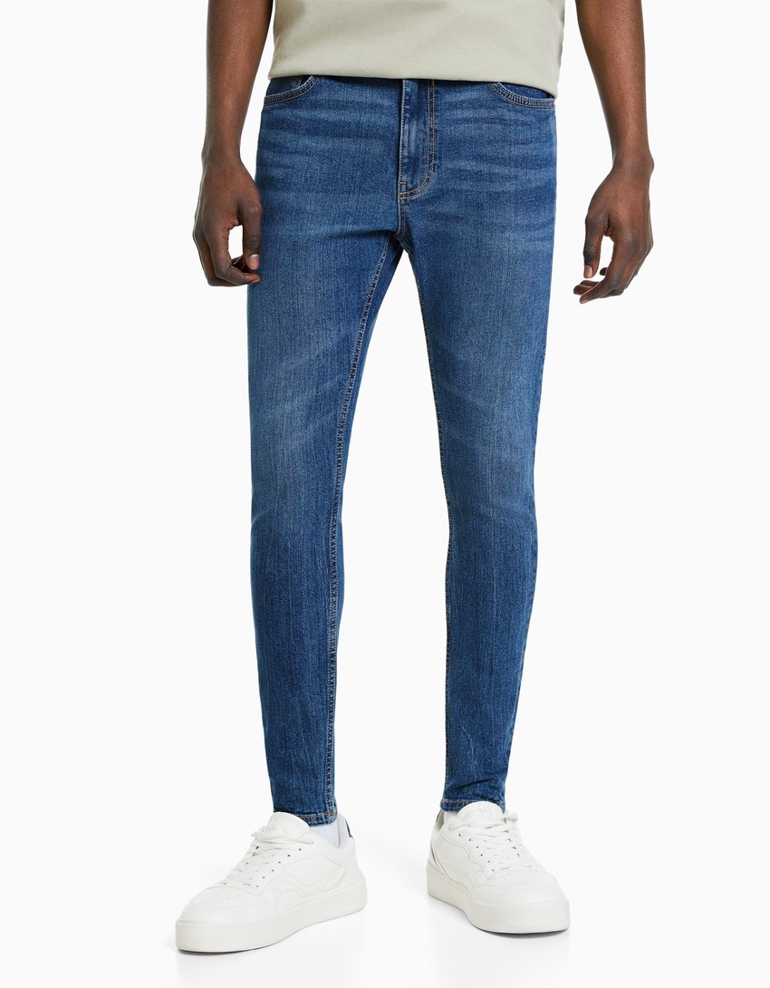 calças jeans super skinny
