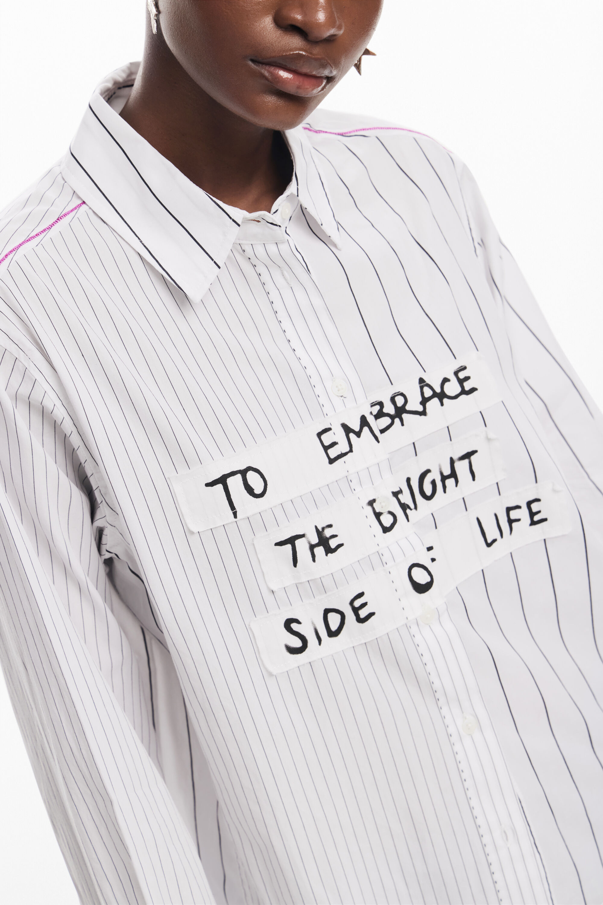 Frase da camisa listrada