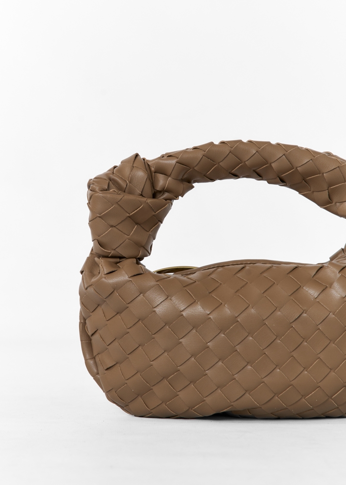 Claire tas bruin