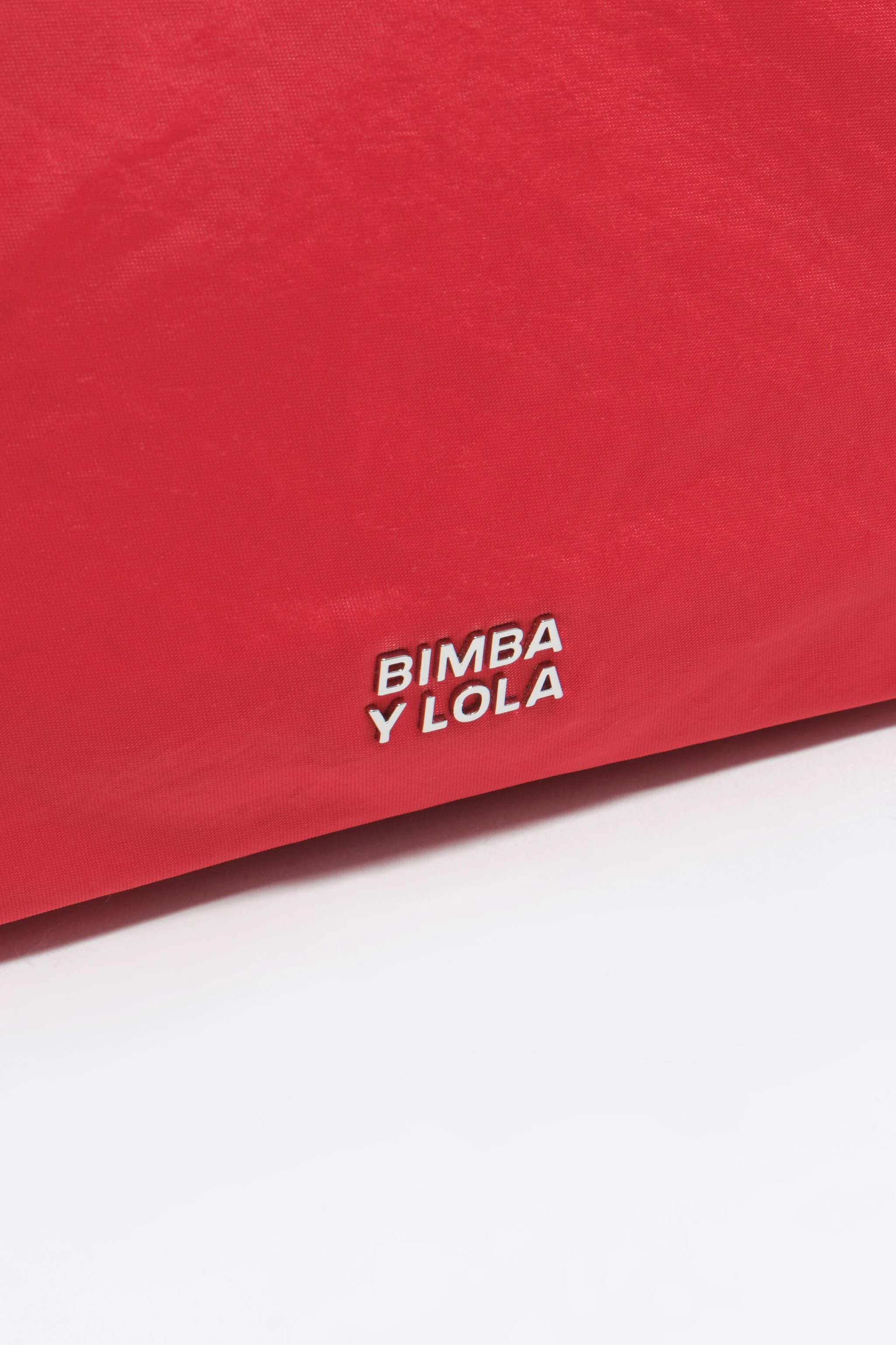 Bolsa de bolso média em náilon vermelho
