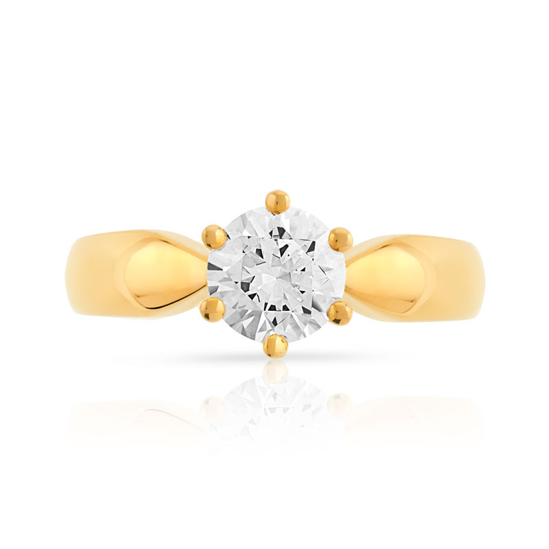 Bague solitaire or 750 jaune dia 70/100e ct H/SI