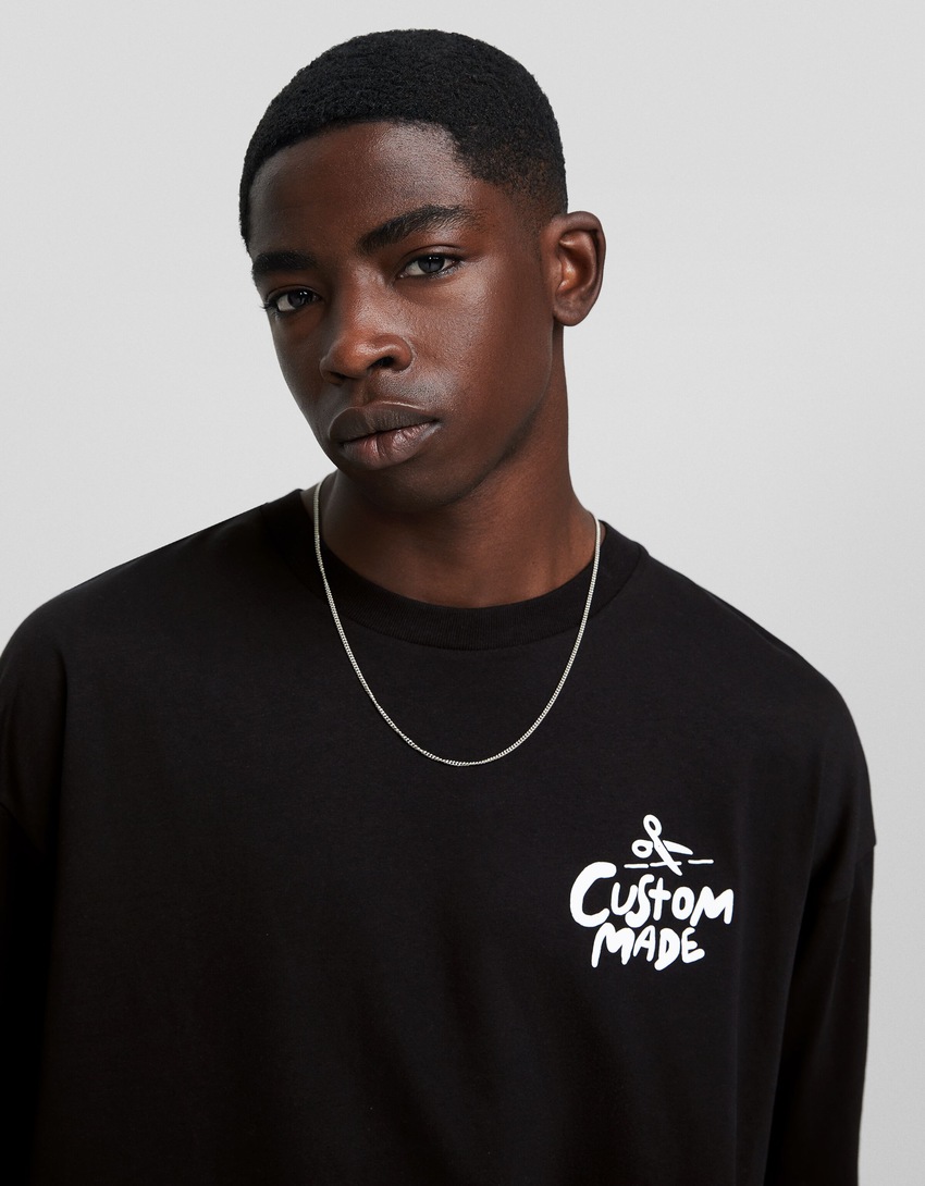 Camiseta de manga curta extra folgada com estampa.