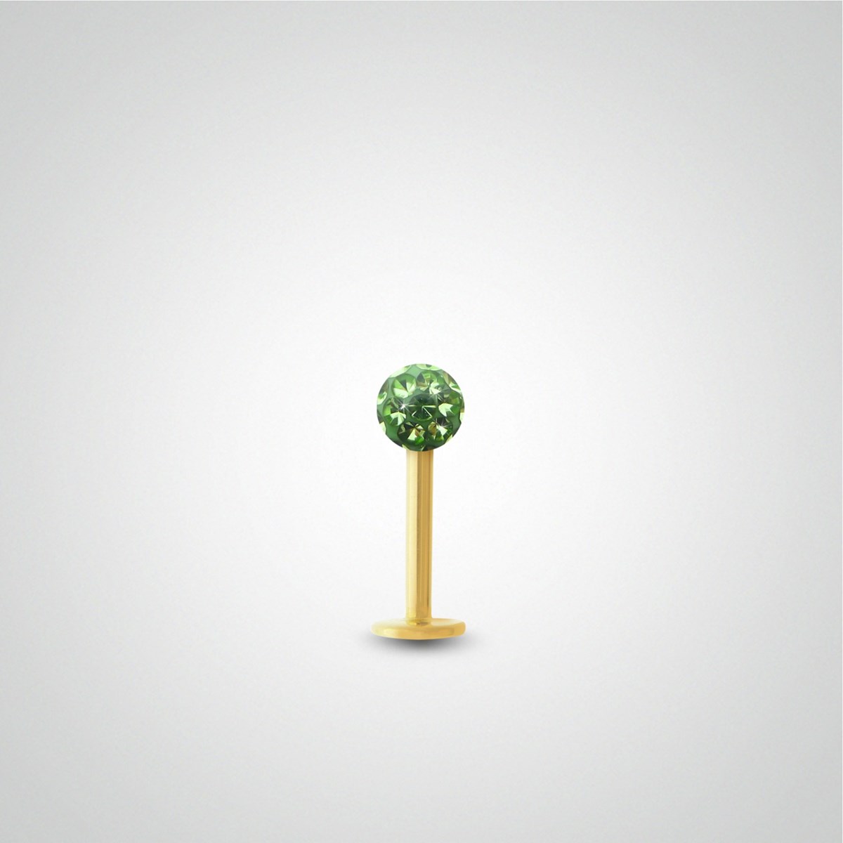 Piercing tragus en or jaune et cristal de Swarovski vert
