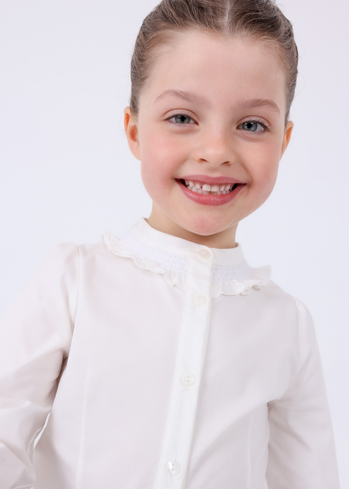 Blusa de malha com detalhes franzidos para menina