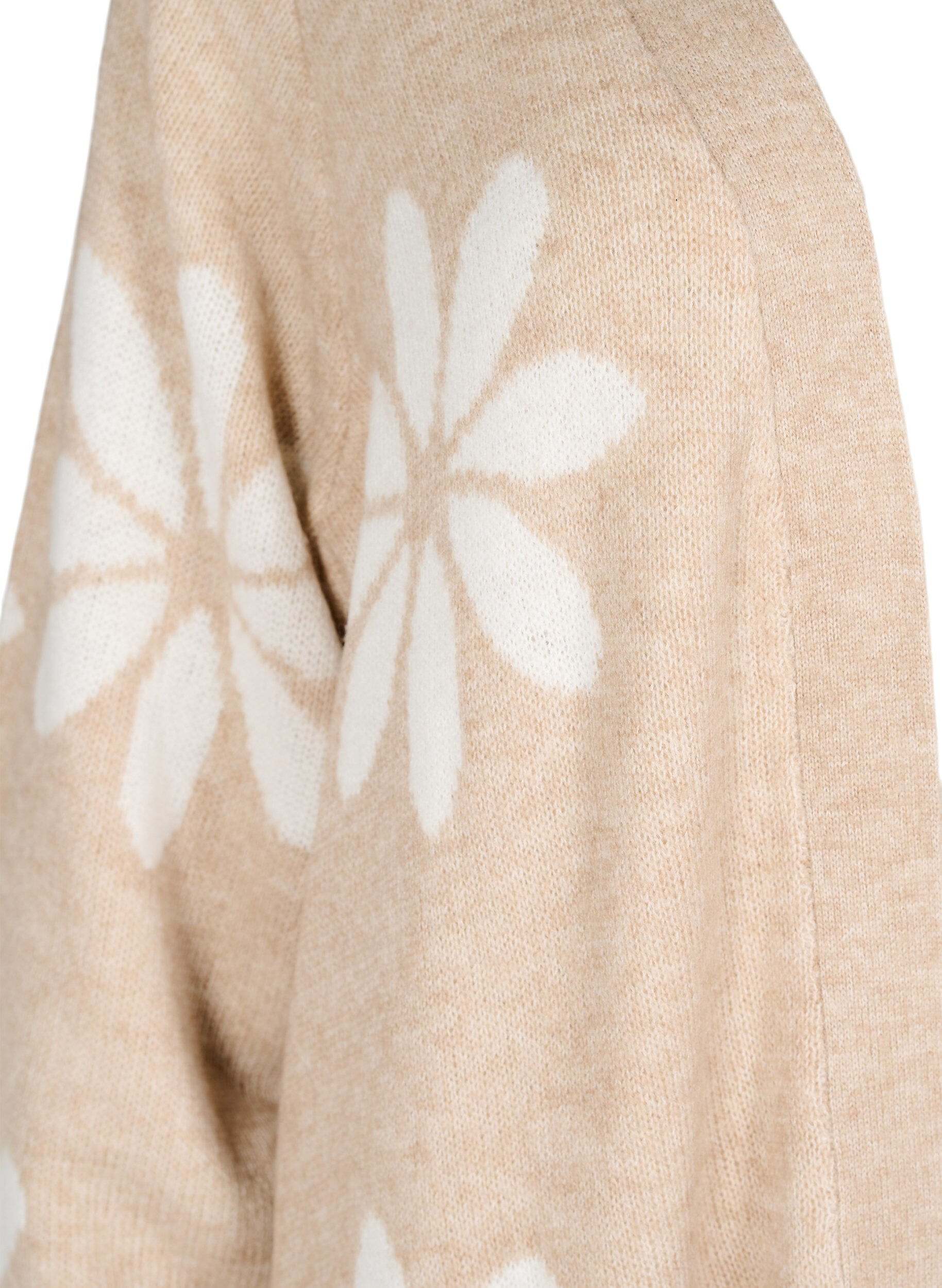 Lang strik cardigan med blomster