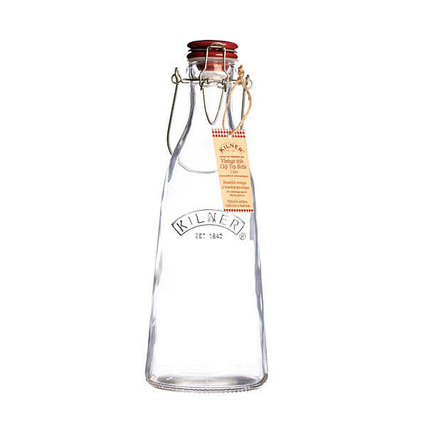 Bouteille en verre avec bouchon et anse