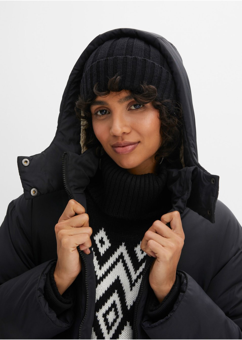 Manteau oversize avec doublure peluche dans la capuche