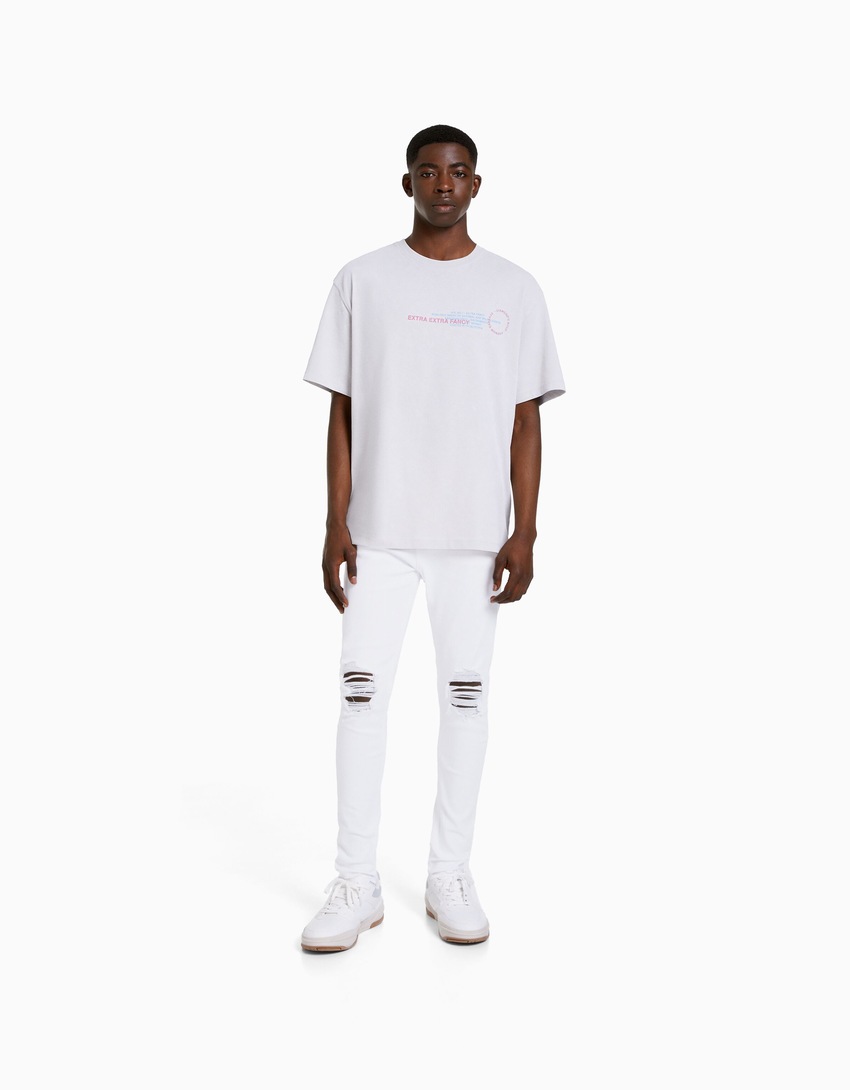calça jeans super skinny rasgada